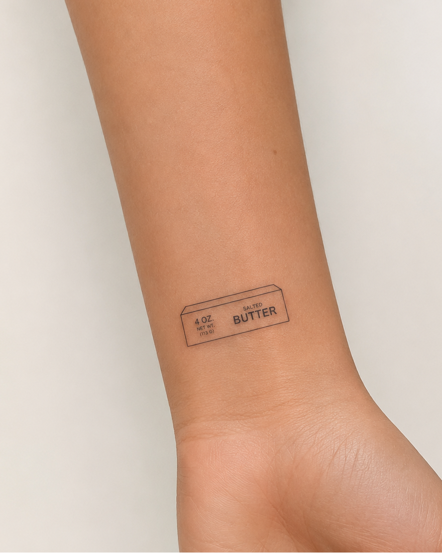 stamp of butter stick on arm